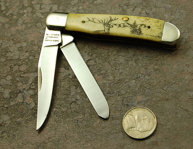 Parker-Edwards Stainless Trapper with bone scales.  Scrimshaw by Diane.

$80