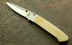 One of Jim Parker's better made knives - Bone Scaled Top-Lock.  Tang Stamp says:
Parker 