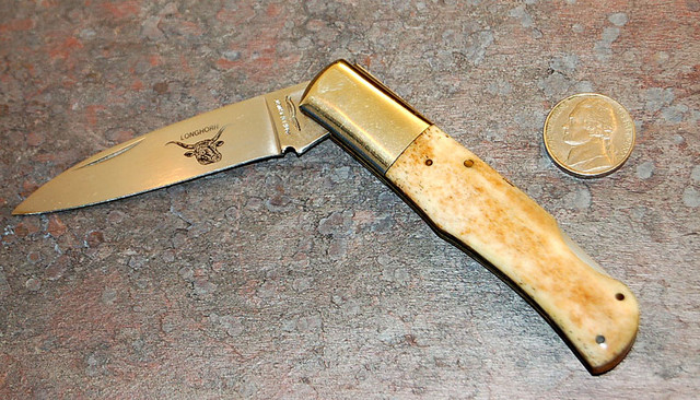 Parker Bone Scaled Longhorn.  Al Mar obviously influenced Parker in this knife style.

$35