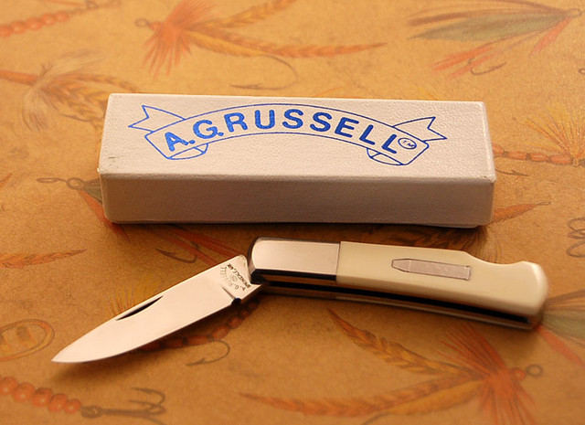 A. G. Russell .45 Long Colt ivory micarta scaled gentleman's folder, new in box.

$85