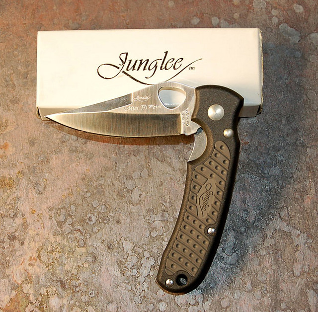 Junglee-tri-point lockback, NIB

$55
